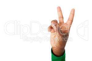 Die Finger formen das Friedenszeichen