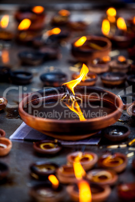 Burning candles in the Indian temple.