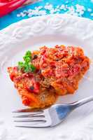 fish in Greek kind with vegetables and tomato sauce