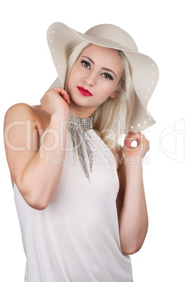 Beautiful young woman with diamond necklace and a hat, isolated