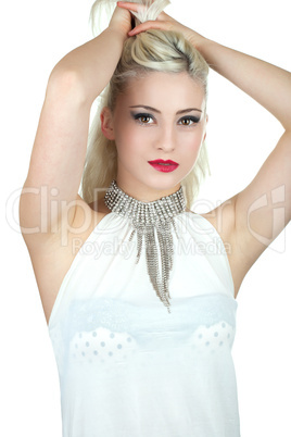 Beautiful young woman with diamond necklace holding her hair up,
