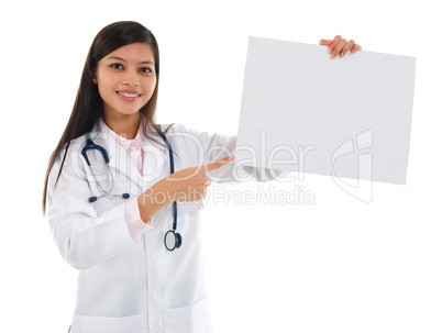 Medical doctor showing white blank placard