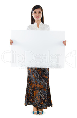 Southeast Asian woman holding a white blank card