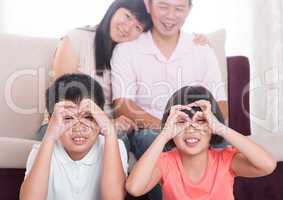 Southeast Asian family at home