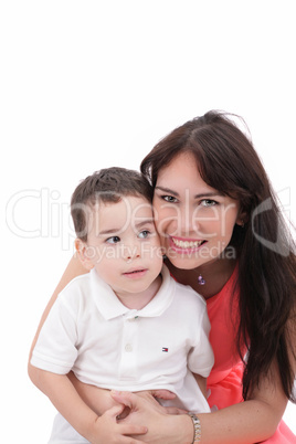 Happy young mother and her son posing together. Isolated over wh