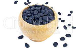 Black beans in a wooden bowl