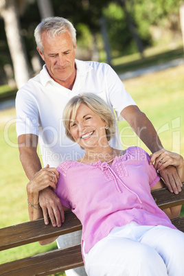 Happy Senior Couple Smiling Outside in Sunshine