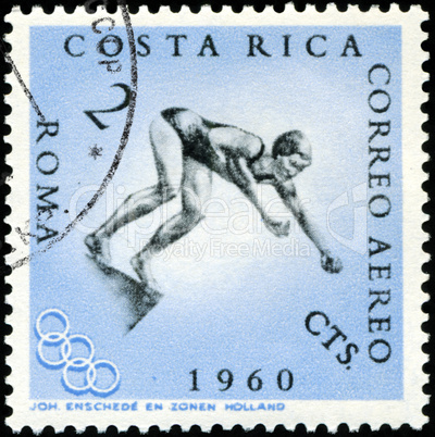 ROMANIA - CIRCA 1960: A stamp printed in the Romania shows Swimm