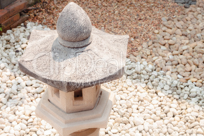 Mini pavillion rock lamp in home garden