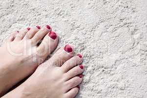 Feet on sand