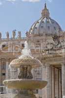 Fountain and Dome of Saint Peter's Basilica in Rome