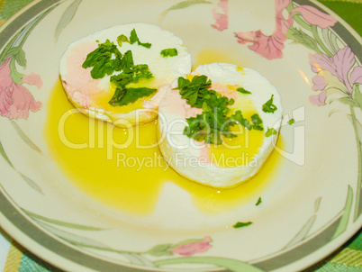 Tomino cheese with rucola and olive oil