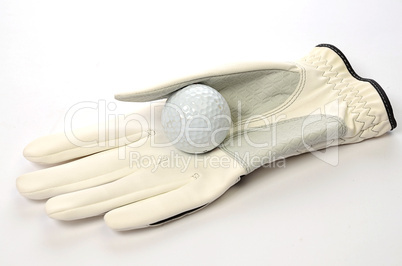 Golfball auf Golfhandschuh