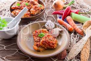 fish in Greek kind with vegetables and tomato sauce