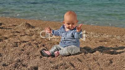 Baby dancing on the beach