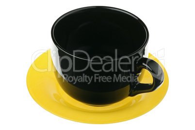Black mug on a yellow plate