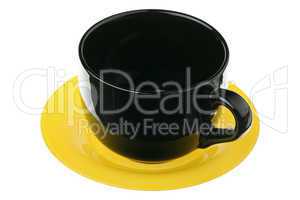 Black mug on a yellow plate
