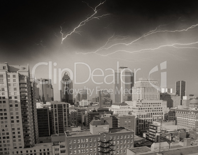 dramatic sky above montreal buildings, canada - aerial view