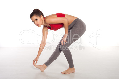 Woman athlete limbering up