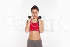 fit young women exercising with dumbbells