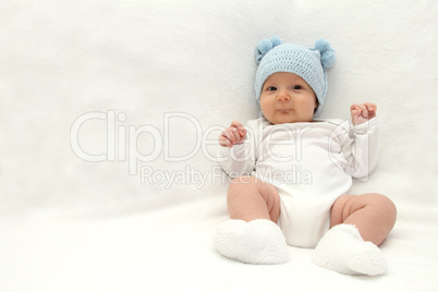 Baby in blue hat