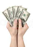 Hands holds hundreds of dollars
