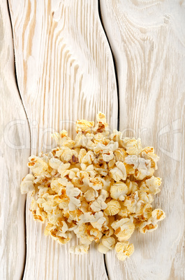 Heap popcorn on white table