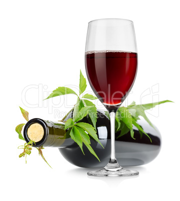 Wineglass and wine bottle with vine