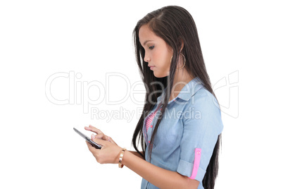 Brunette woman typing on her new electronic tablet touch pad com