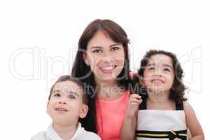 Mother, son and daughter in a happy embrace on a white backgroun