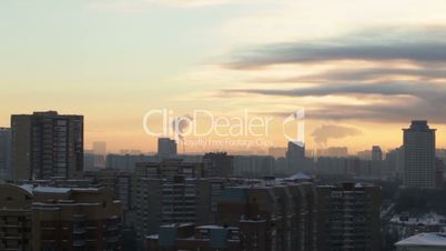 Sunrise over the city. Time lapse.