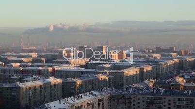 Sunrise over the city. Time lapse. Urban cityscape.