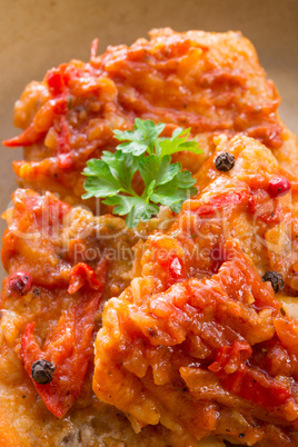 fish in Greek kind with vegetables and tomato sauce