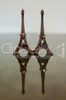 wedding rings on the eiffel tower figurines