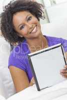 Mixed Race African American Girl Using Tablet Computer