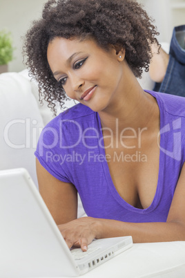 Mixed Race African American Girl Using Laptop Computer