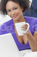 Mixed Race African American Girl Using Laptop Computer