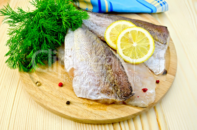 Fillet of codfish on board with napkin