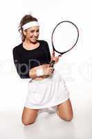 fun, happy young woman ready to play tennis