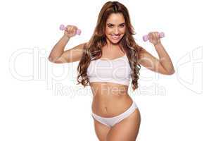 beautiful girl working out with dumbbells