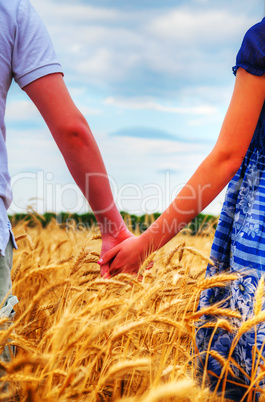 Young couple holding hands