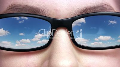Sky reflected in glasses