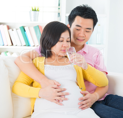 Pregnant woman drinking water