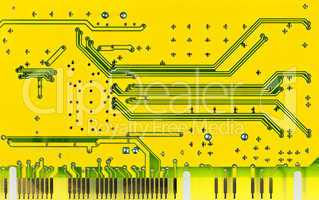 Close up of a yellow computer microcircuit