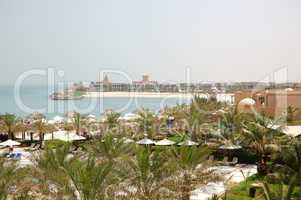 Recreation area of luxury hotel and beach with luxury villas, Ra