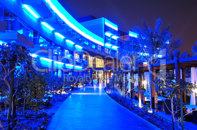 Night illumination of the modern luxury hotel, Dubai, UAE