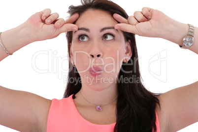 Portrait of a funny young woman looking up on isolated backgroun