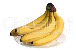 Bananas over plate