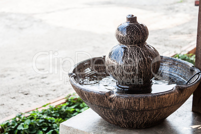 Jar fountain decorated home  garden