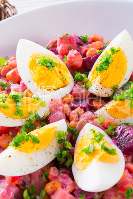 Red beet salad with egg